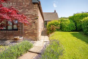 Entrance and Side Garden- click for photo gallery